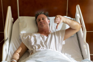 Sick person in bed, but the tests show they're fine.